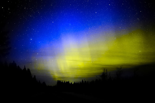Aurora borealis colored in blue and yellow like the Ukrainian flag.