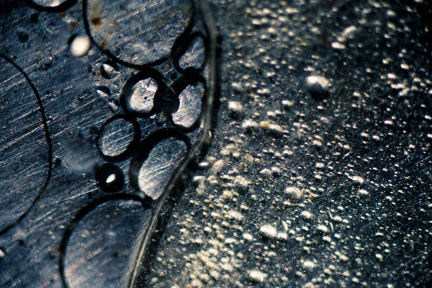 Abstract steel texture with oil and water bubblea