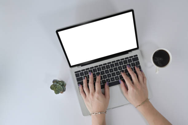 istock Above view woman hands typing on laptop computer keyboard. 1394354496