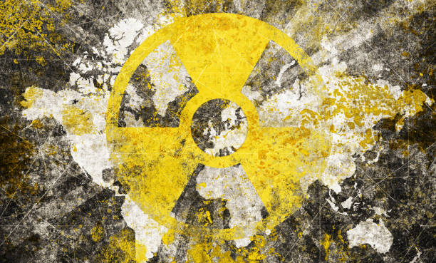 Nuclear danger symbol with world map stock photo