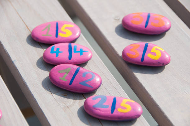 Homemade domino game with pebbles