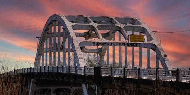 Edmund Pettus Bridge panorama Selma, Alabama, USA-March 1, 2022: Panorama of historic Edmund Pettus Bridge in Selma, the sight of the Bloody Sunday beatings during the Civil Rights Movement. civil rights act stock pictures, royalty-free photos & images