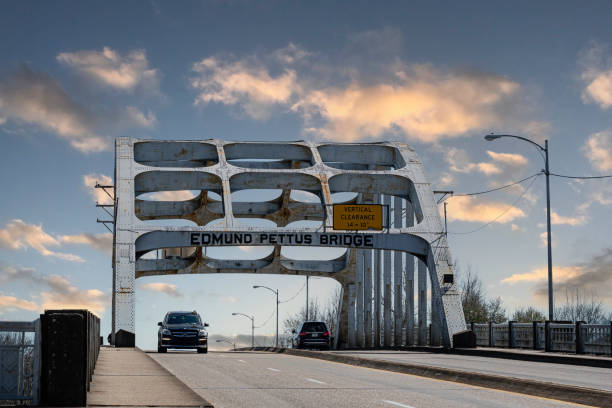 Edmund Pettus Bridge Selma, Alabama, USA-March 1, 2022: Historic Edmund Pettus Bridge in Selma, the sight of the Bloody Sunday beatings during the Civil Rights Movement. Built in 1940, it is named after a former Confederate officer, U.S. Senator and Grand Dragon of the Ku Klux Klan. civil rights act stock pictures, royalty-free photos & images