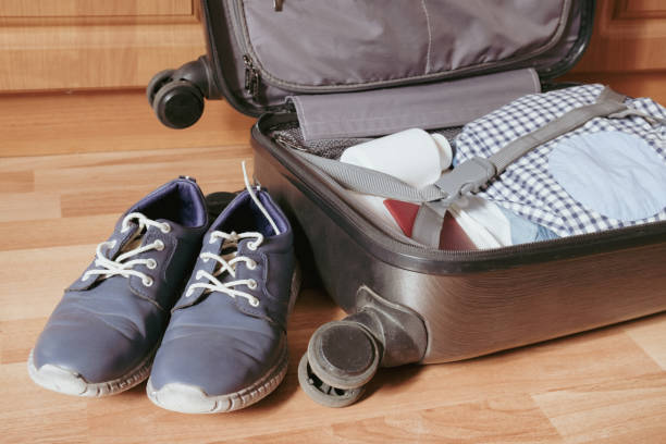 istock Dismantling of things after returning from a trip 1394369673