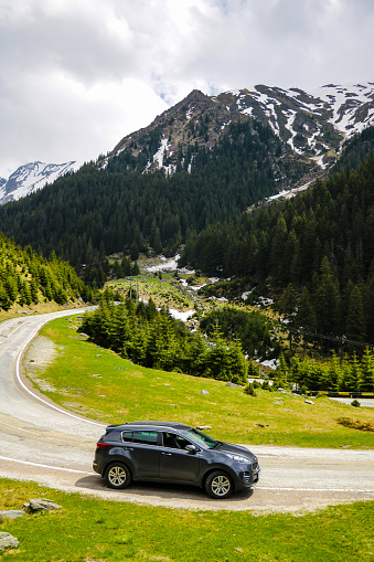 Slovakia, April 24, 2019: Kia Sportage stands on the side of a mountain road