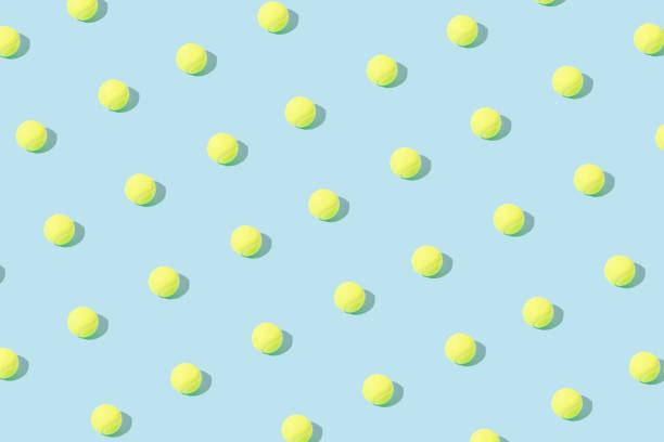 istock Pattern made of yellow tennis balls. Minimal concept. 1394373250