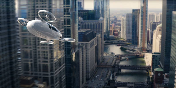 eVTOL Electric Vertical Take Off and Landing Aircraft Flying Through Skyscrapers stock photo