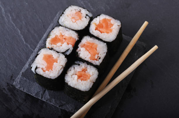 istock Maki rolls with over grey background. Japanese Sushi. close up 1394376021
