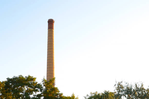 A large boiler room or production pipe against the sky