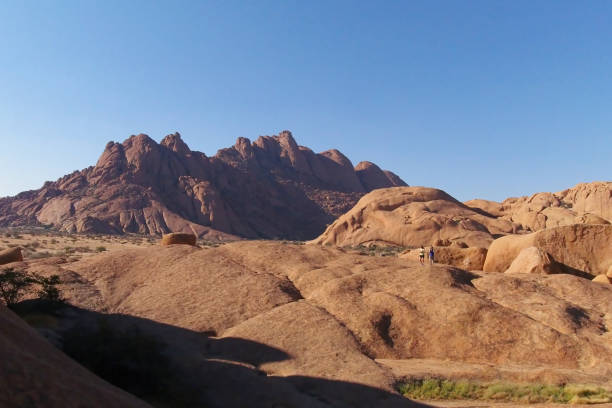 istock Mountain in Spitzkoppe, Namibia, with the sky in the background 1394379300
