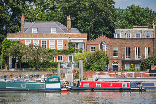 Riverside houses and hope pier in Hammersmith, West London, England