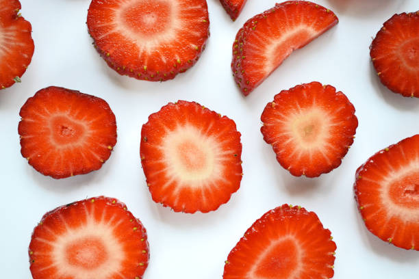 istock Strawberry slices as seamless pattern isolated on white background 1394381815