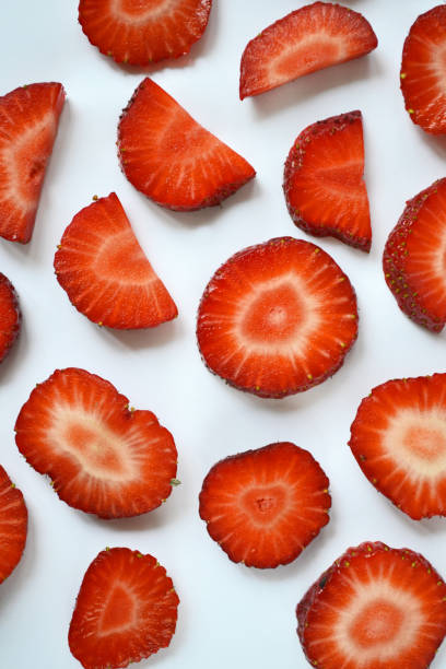 istock Strawberry slices as seamless pattern isolated on white background 1394381825