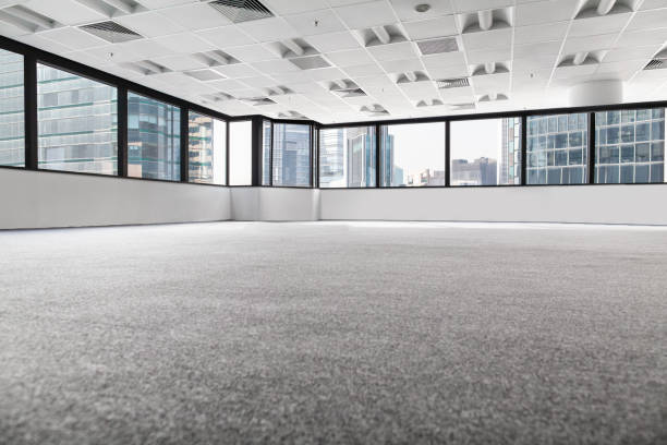 istock Empty commercial business office interior space view in urban city downtown 1394384604