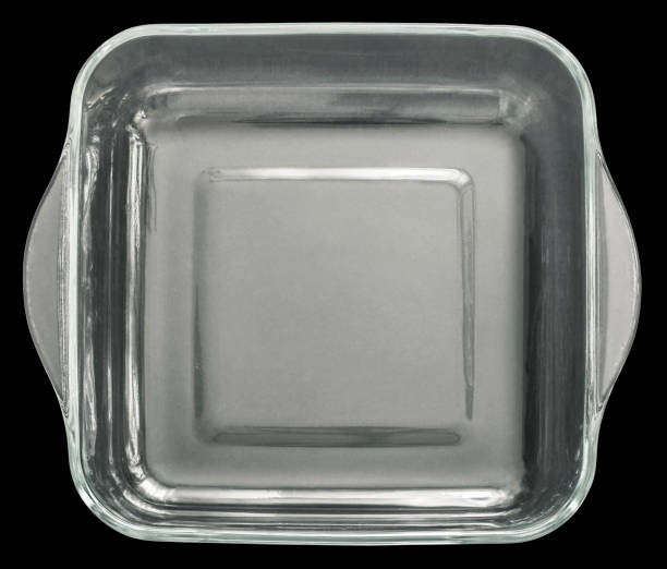istock Rounded Square Glass Baking Pan With Curved Handles Isolated On Black Background 1394390506
