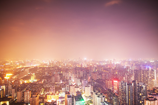 Night view of Guangzhou cityscape with urban building sprawl, China