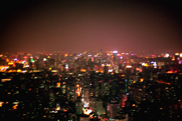 Night view defocused of Guangzhou cityscape with urban building sprawl Night view defocused of Guangzhou cityscape with urban building sprawl, China drunk visual stock pictures, royalty-free photos & images