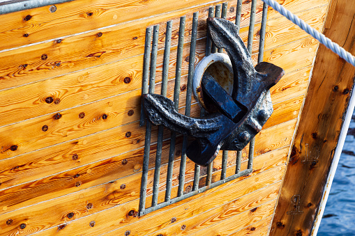 Anchor of a wooden boat moored at Nusfjord in Norway.