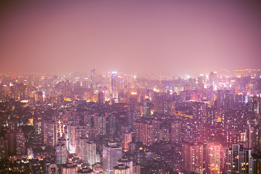 Night view of Guangzhou cityscape with urban building sprawl, China
