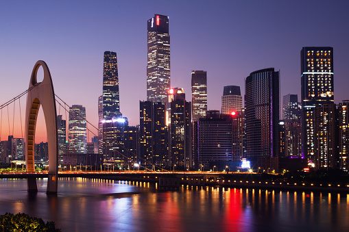 Dusk view of Guangzhou's Zhujiang New Town central business area of Tianhe District, with Liede Bridge China