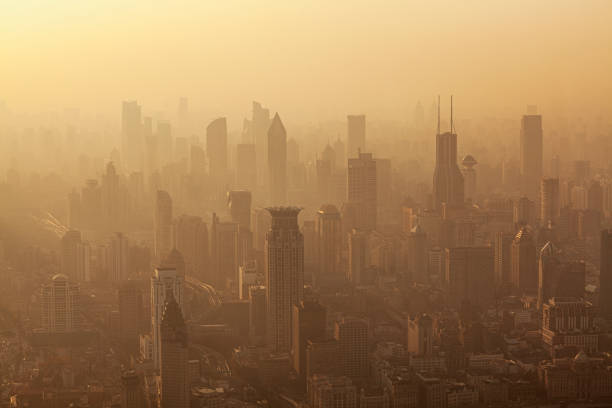 Air pollution seen over Shanghai's Puxi District buildings at dusk, China stock photo