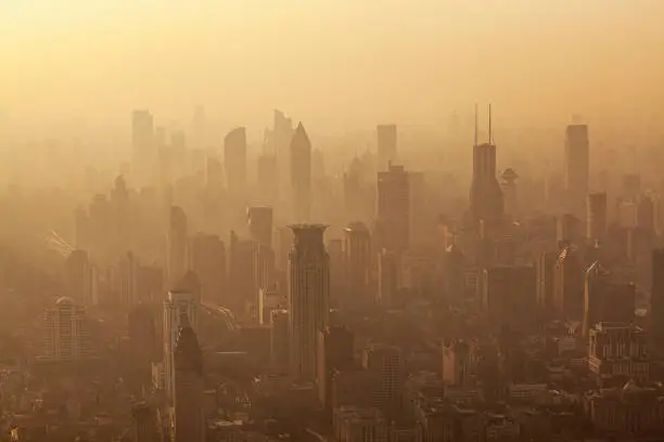 Air pollution seen over Shanghai's Puxi District buildings at dusk, China