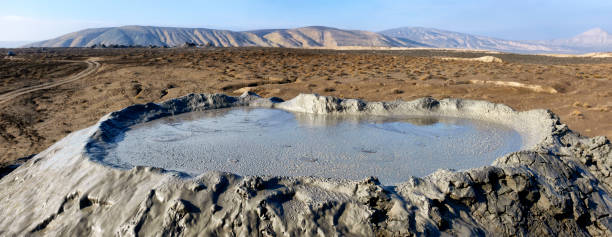 Mud vulcano Mud vulcano in Gobustan National Park, Azerbaijan mud volcano stock pictures, royalty-free photos & images