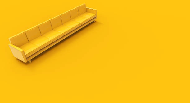 istock Extremely long yellow sofa isolated on yellow background. 3d rendering 1394396348