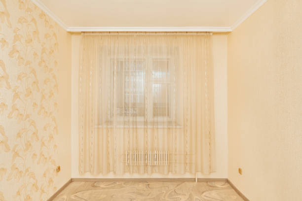 istock bright empty room with a window in the apartment 1394396497