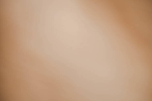 istock blurred background brown color gradient soft focus.Template and wallpaper 1394397667
