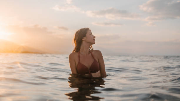 istock Enjoying the sea and the sunset 1394400374