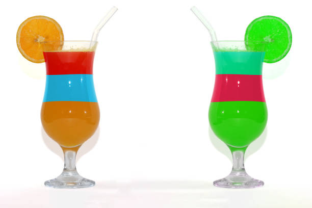 non alcoholic colorful cold party drink with slice of fruit and drinking straw.