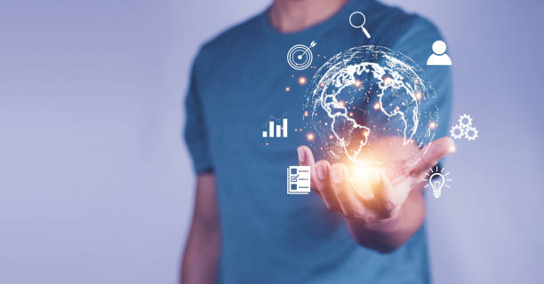 istock Man  holding virtual Global Internet connection metaverse. Business global internet connection application technology and digital marketing, Financial and banking, Digital link tech, big data. 1394404689