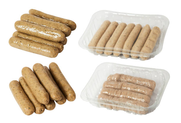 istock Raw vegetarian sausages isolated on white background with clipping path. 1394407771