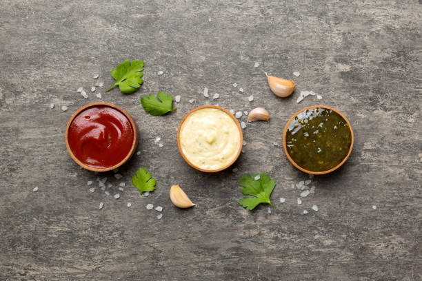 istock Many different sauces and herbs on table, flat lay top view. sauces with spices healthy concept 1394409908