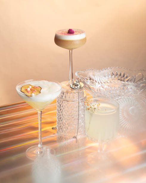 Set of light beige cocktails with foam on a light background. Party concept stock photo