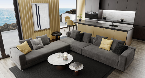 Luxury apartment with living room interior and modern minimalist kitchen with big kitchen island and stools.\nBlack matte cabinets with dark gold details. Black carpet. Grey sofa. Hardwood floor.  Italian style interior design. 3d rendering