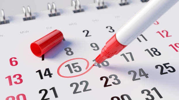 pojęcie ważnego dnia, przypomnienia, organizowania czasu i harmonogramu - czerwony marker oznaczający dzień miesiąca w kalendarzu. renderowanie 3d - ostateczny termin zdjęcia i obrazy z banku zdjęć