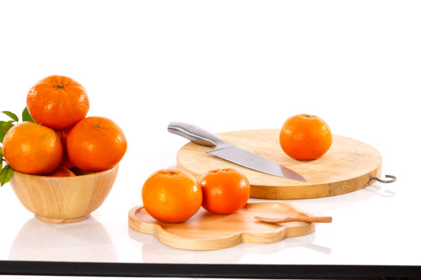 istock orange goldern and knife  on the white table 1394414613