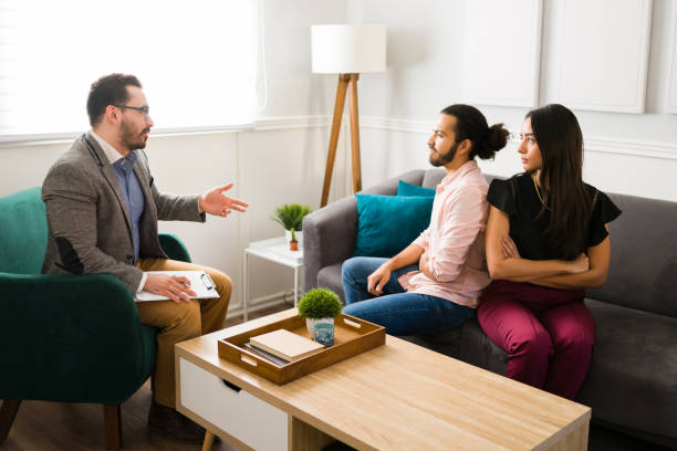 istock Psychologist asking questions during couples therapy 1394416297