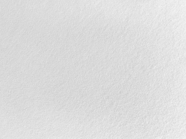 istock Felt white soft rough textile material background texture close up,poker table,tennis ball,table cloth. Empty white fabric background.