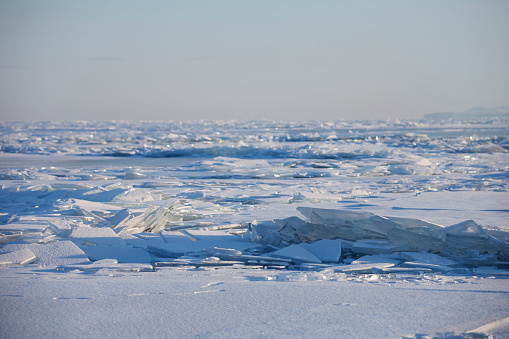 Lake Baikal ice near Olkhon island. Winter landscape