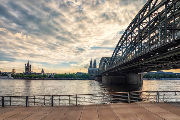 Cologne cathedral and bridge at dusk