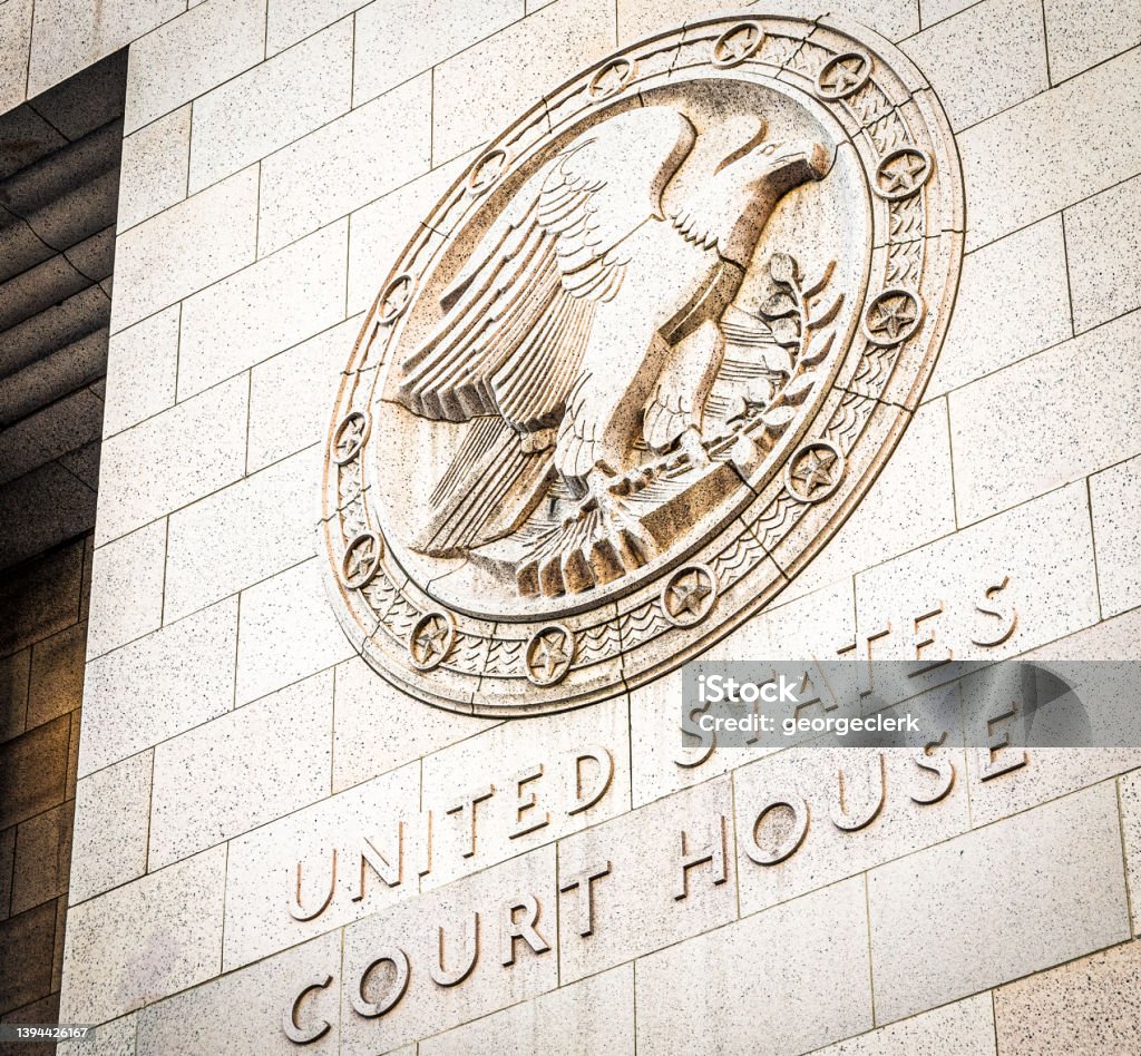 Sign on outside of United States Court House in LA A carved sign for the US Court House in central Los Angeles, California. Courthouse Stock Photo