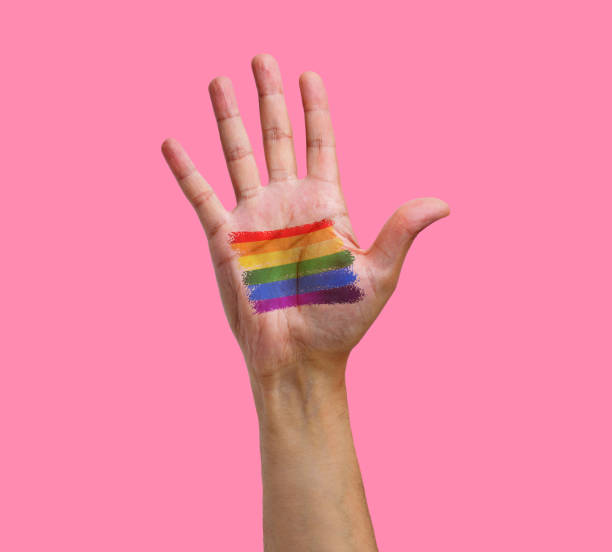 istock rainbow falg on a palm of hand 1394429522