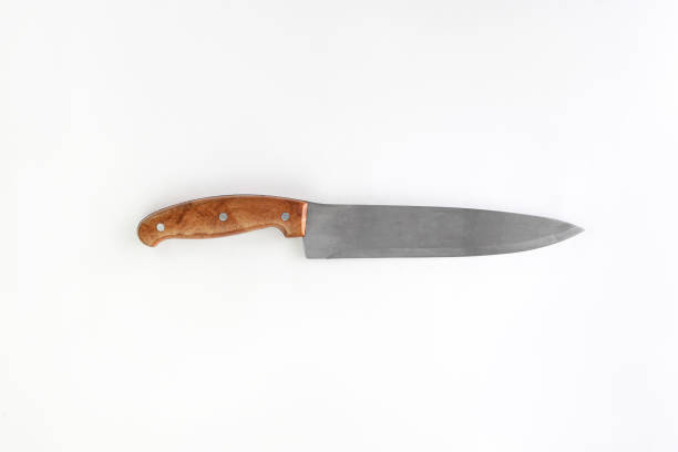 istock Kitchen chef knive for meat laying on white background, flat lay, view from above, space for a text 1394431232