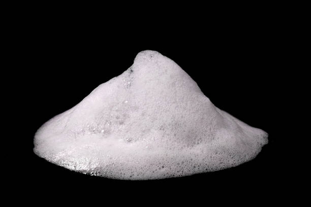 istock liquid white foam from soap or shampoo or shower gel. 1394431432