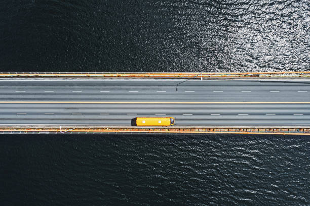 istock Aerial View of School Bus 1394432842