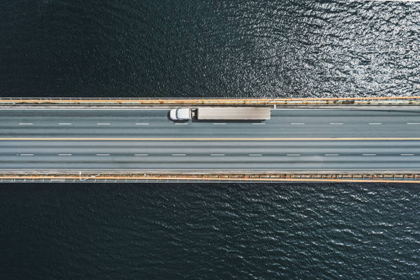 istock Semi Truck Crossing Bridge 1394432848