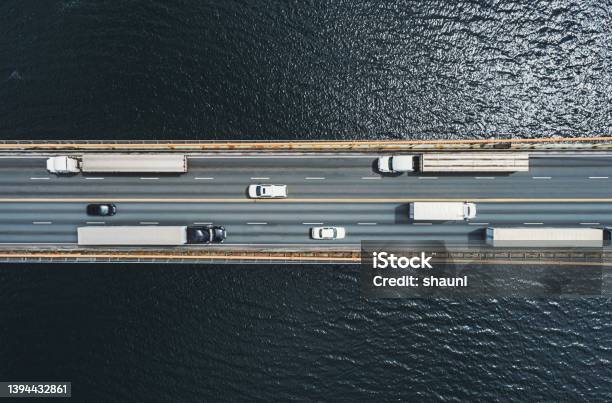 Semi Trucks On Bridge Stock Photo - Download Image Now - Truck, Road, Aerial View
